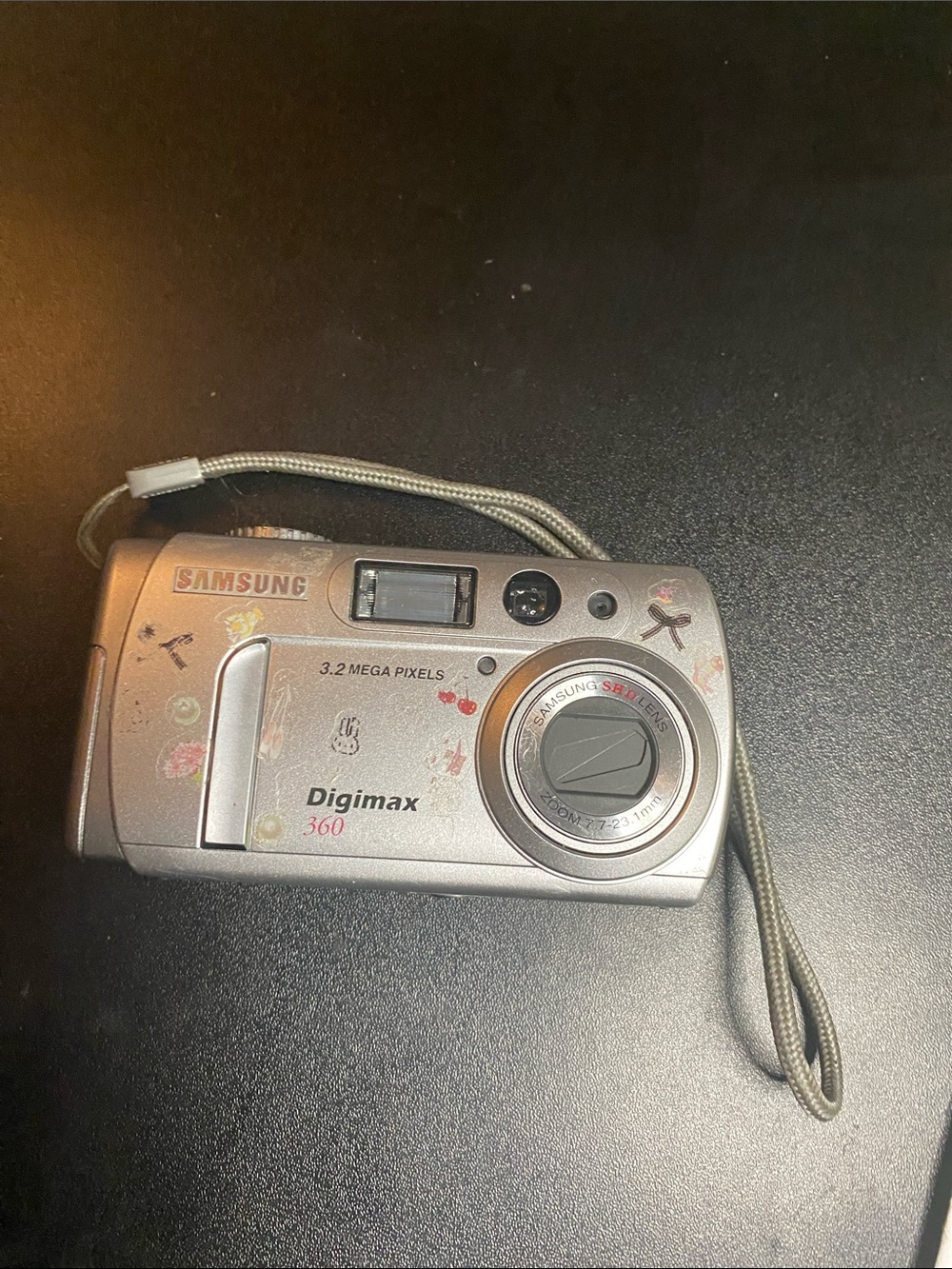 Samsung Silver Digimax 360 Compact Digital Camera with Wrist Strap.